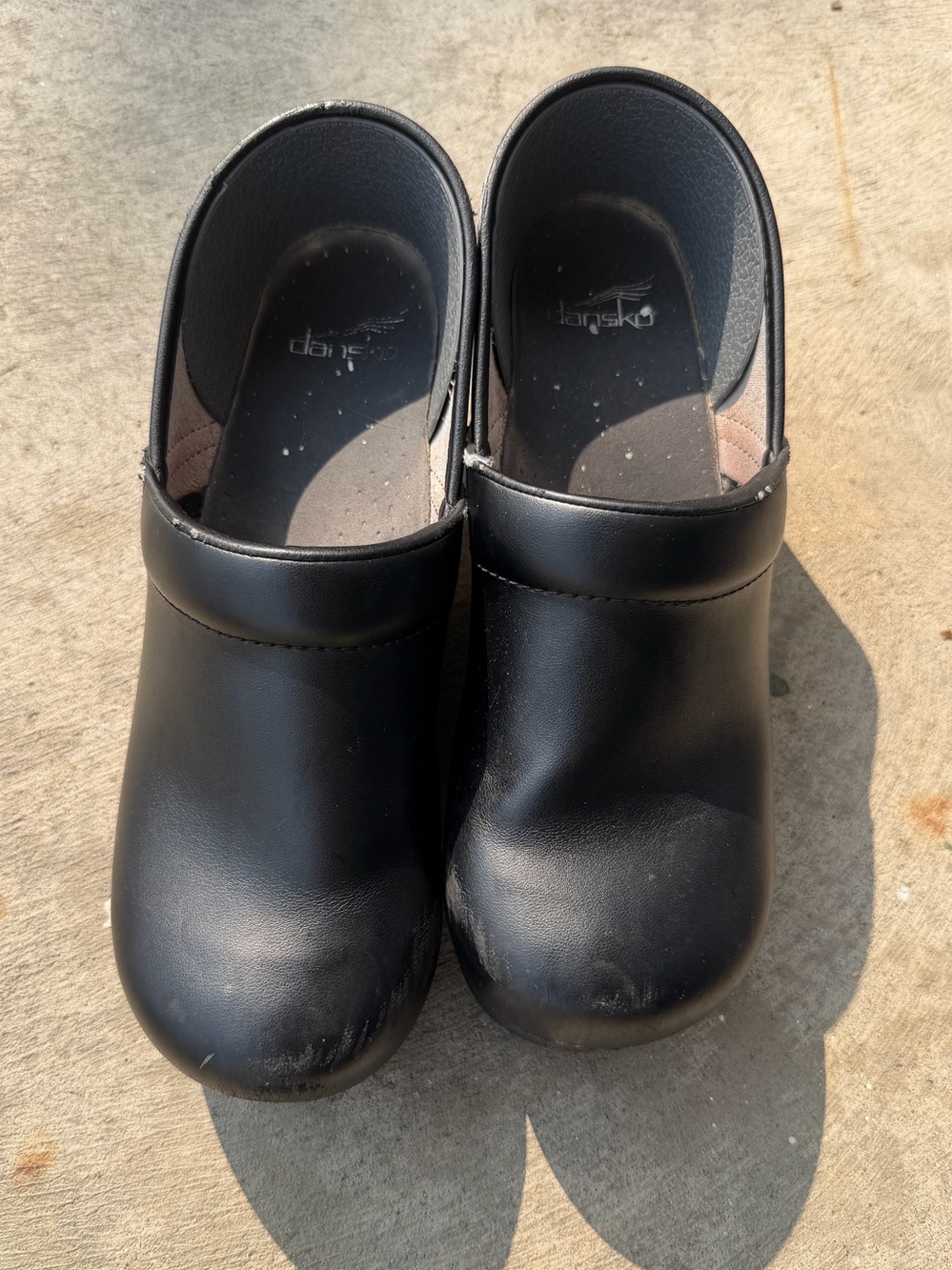 Dansko Black Slip-On Leather Clogs
